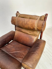 Set_of_Leather_Lounge_Chair_and_Ottoman_by_Arne_Norell_for_Norell_Möbel_AB,_Buffalo_Leather_and_Wood,_Sweden,_1970s