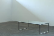 Danish_Modern_Glass_and_Chrome_Coffee_Table_with_Sled_Base,_1990s