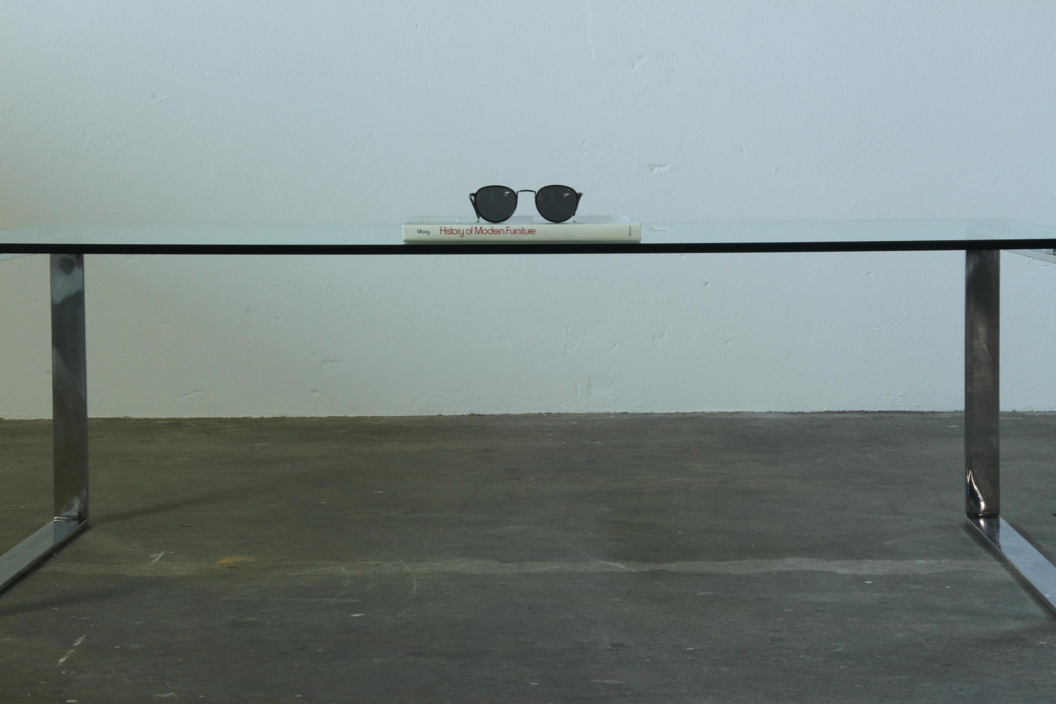 Danish_Modern_Glass_and_Chrome_Coffee_Table_with_Sled_Base,_1990s
