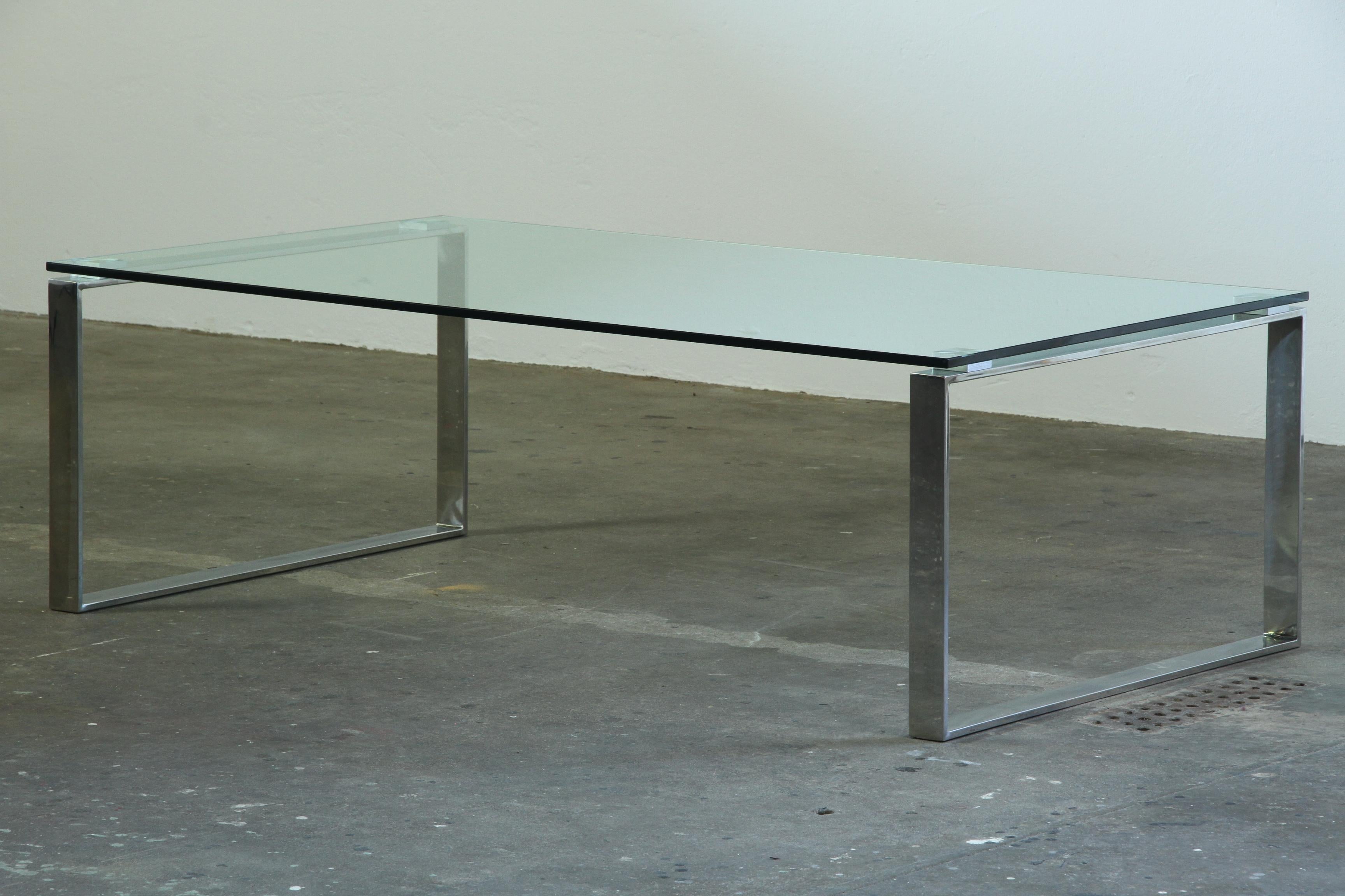 Danish_Modern_Glass_and_Chrome_Coffee_Table_with_Sled_Base,_1990s