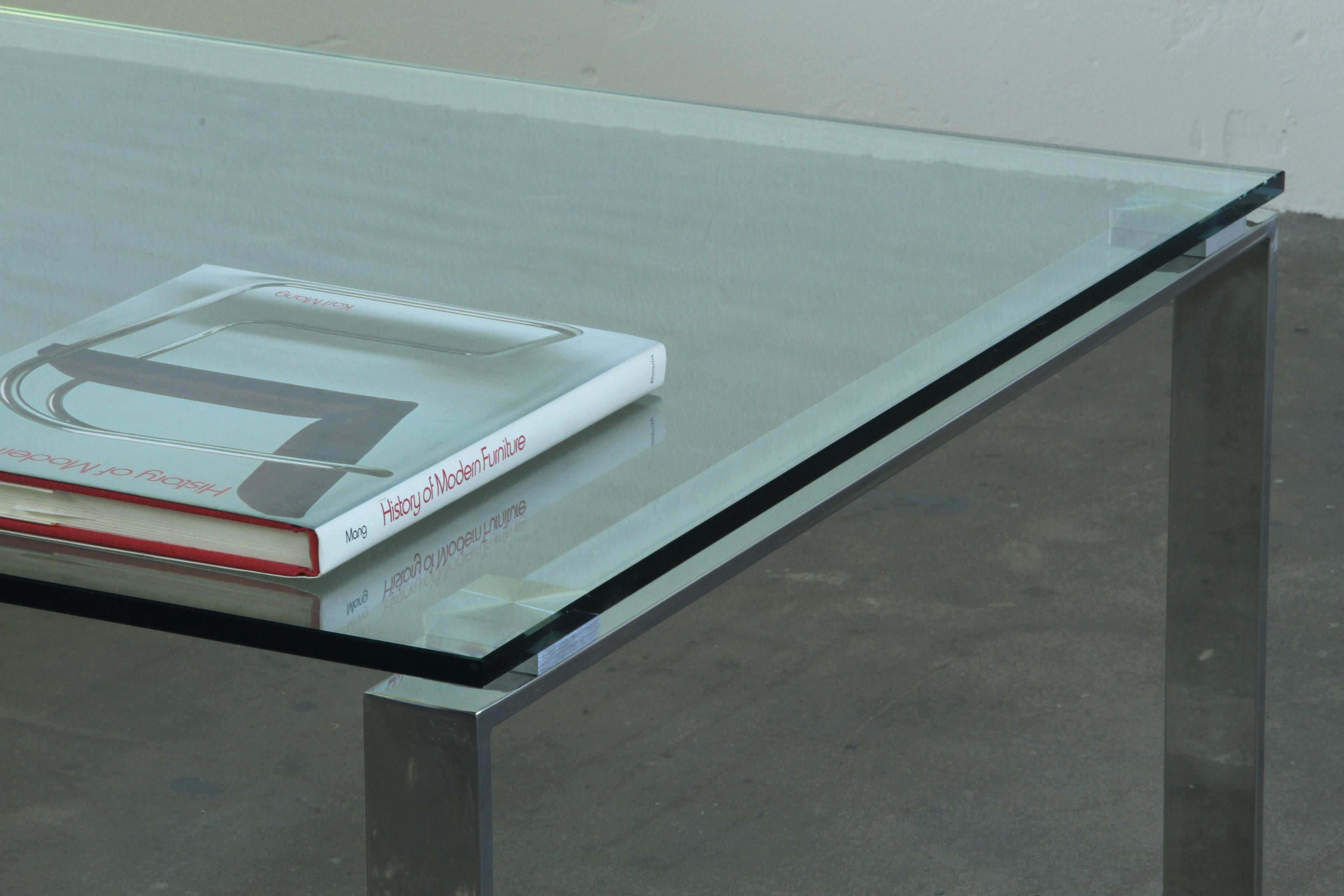 Danish_Modern_Glass_and_Chrome_Coffee_Table_with_Sled_Base,_1990s