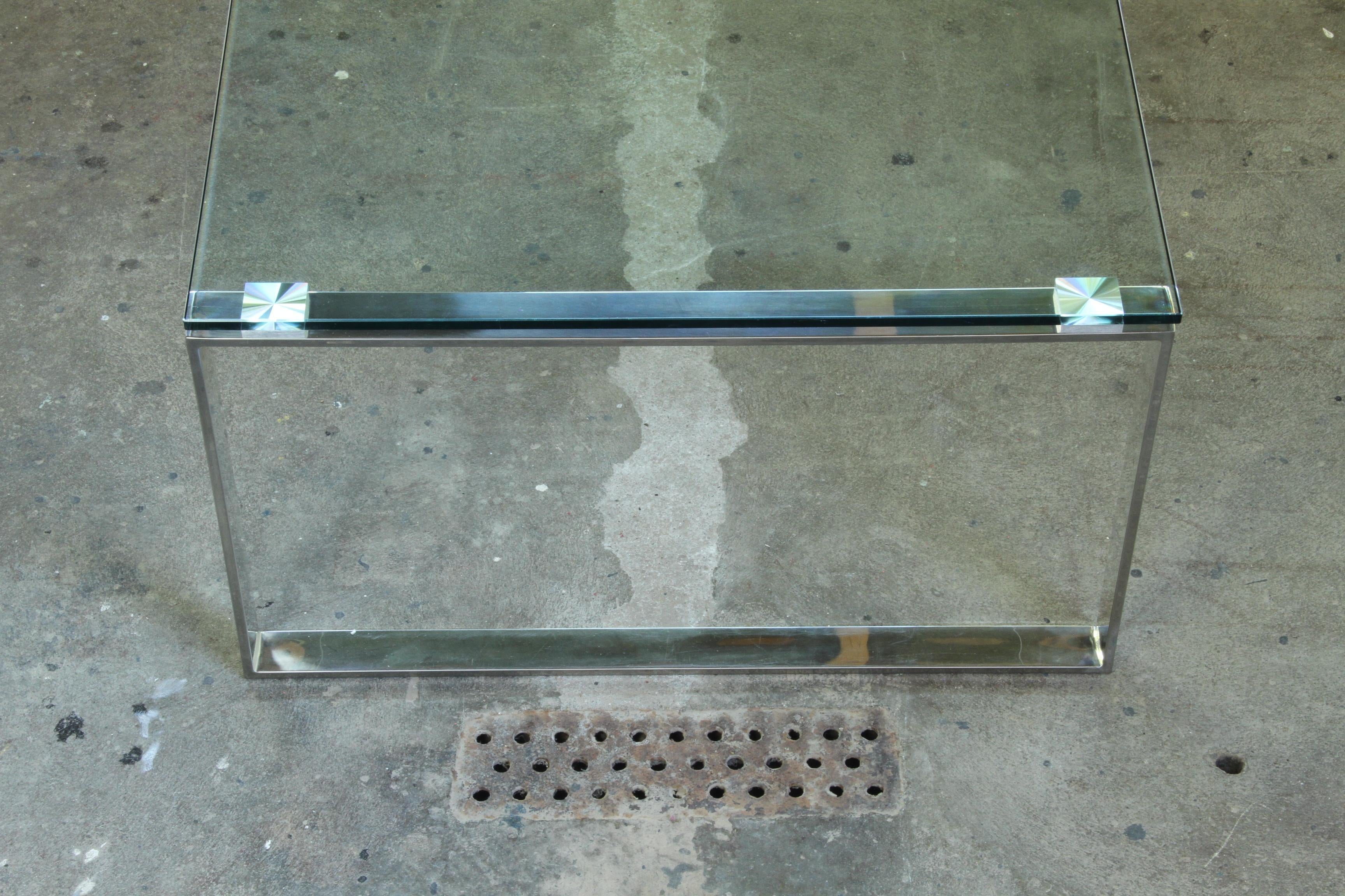Danish_Modern_Glass_and_Chrome_Coffee_Table_with_Sled_Base,_1990s