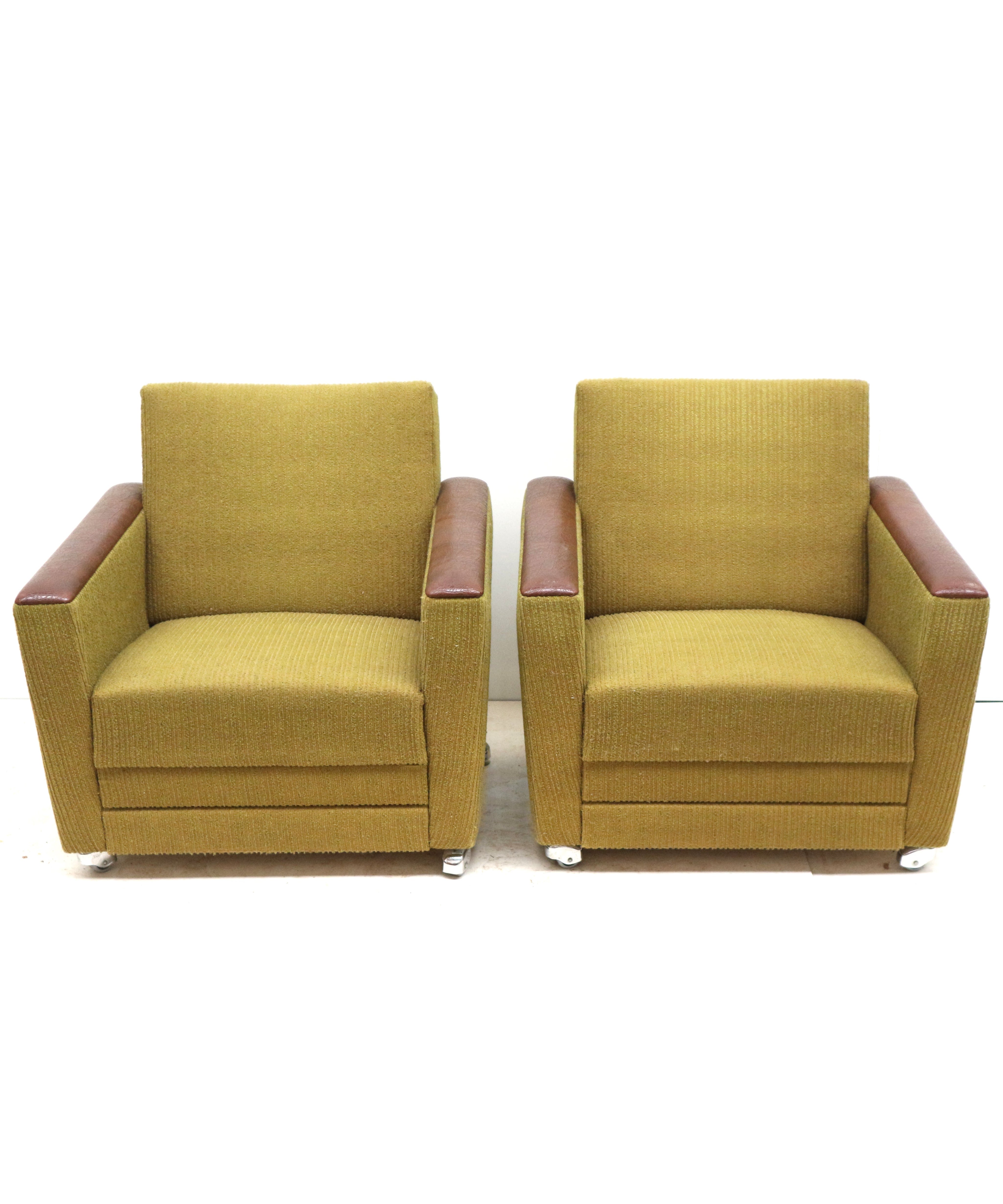 Set_of_2_Mid_Century_Armchairs_with_Leather_Armrests_and_Castors,_1950s–1960s