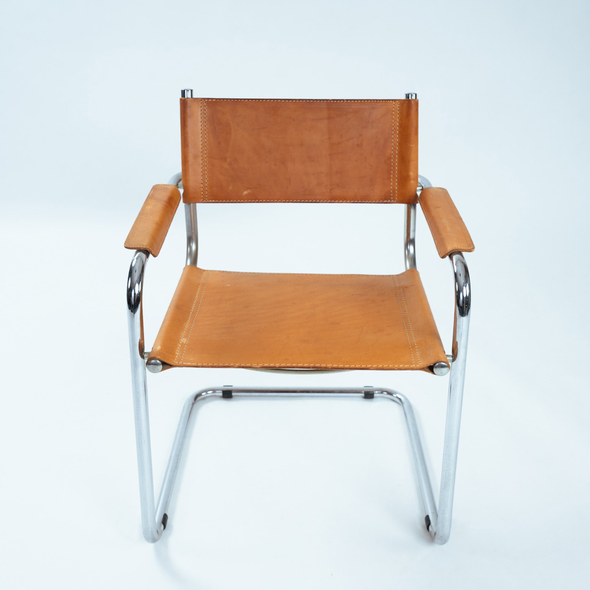 Set_of_4_B34_Cantilever_Dining_Chairs_by_Marcel_Breuer,_Cognac_Saddle_Leather_and_Chrome,_Bauhaus_Design