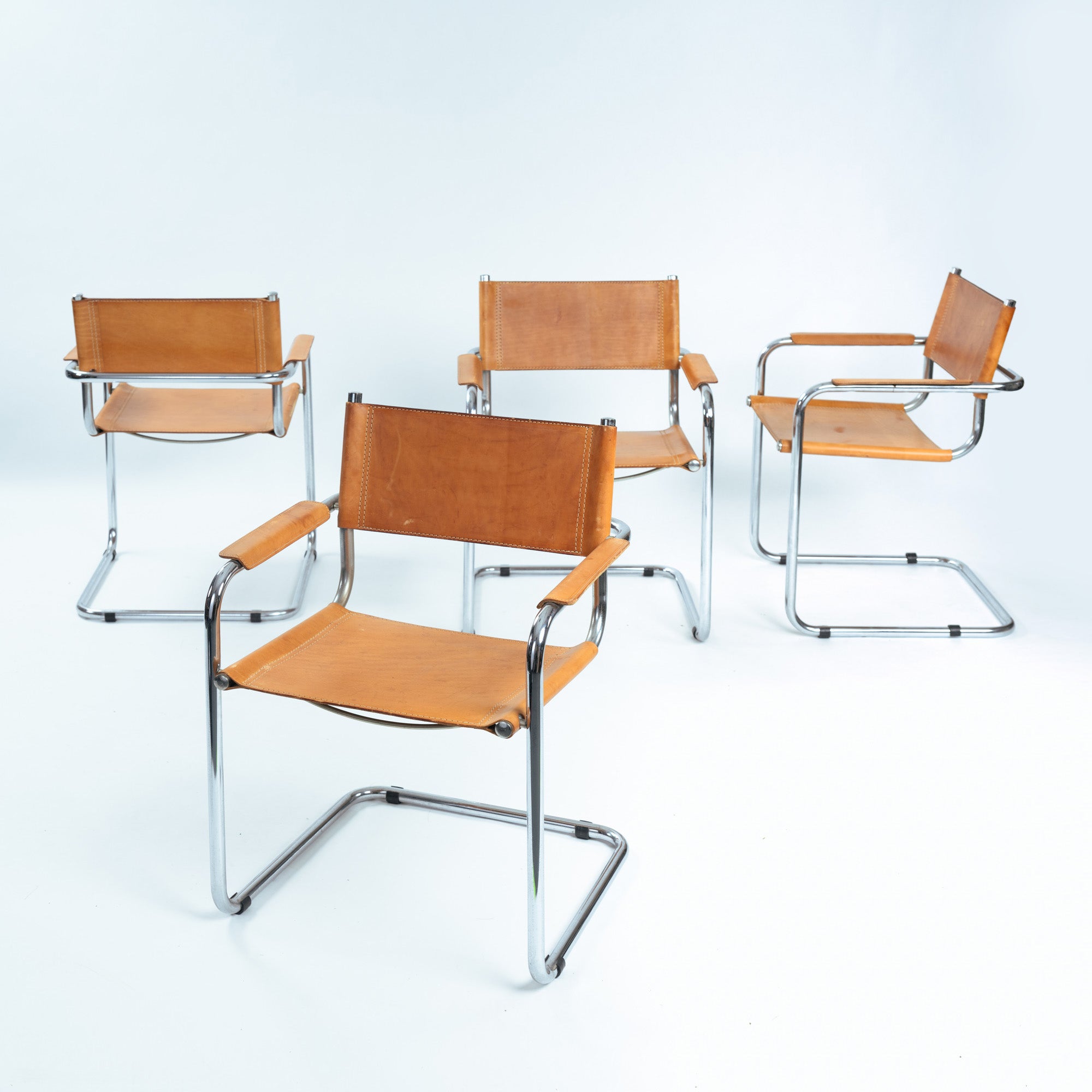 Set_of_4_B34_Cantilever_Dining_Chairs_by_Marcel_Breuer,_Cognac_Saddle_Leather_and_Chrome,_Bauhaus_Design