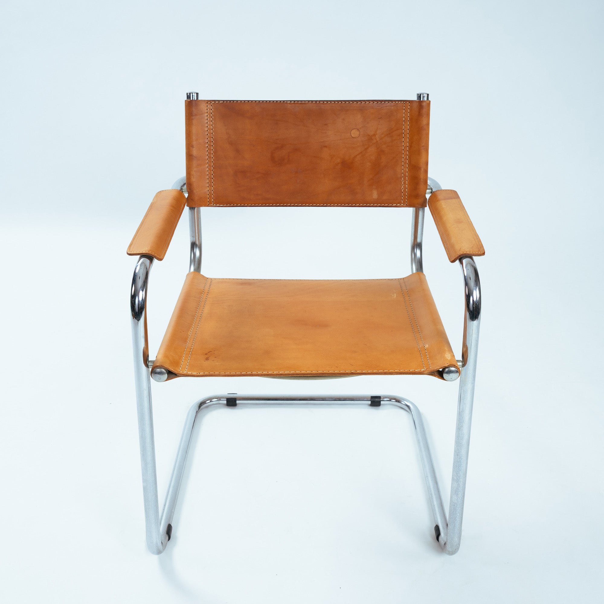 Set_of_4_B34_Cantilever_Dining_Chairs_by_Marcel_Breuer,_Cognac_Saddle_Leather_and_Chrome,_Bauhaus_Design