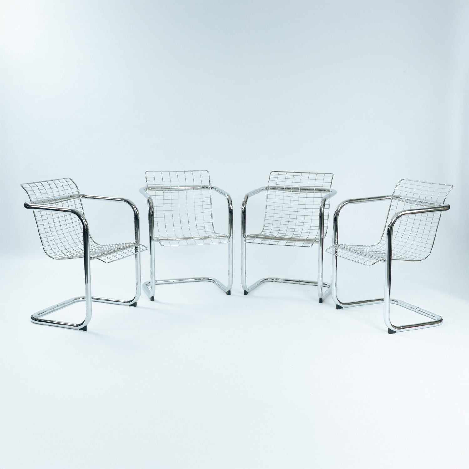 Set_of_4_Vintage_Cantilever_Wire_Dining_Chairs,_Minimalist_Modern_Design