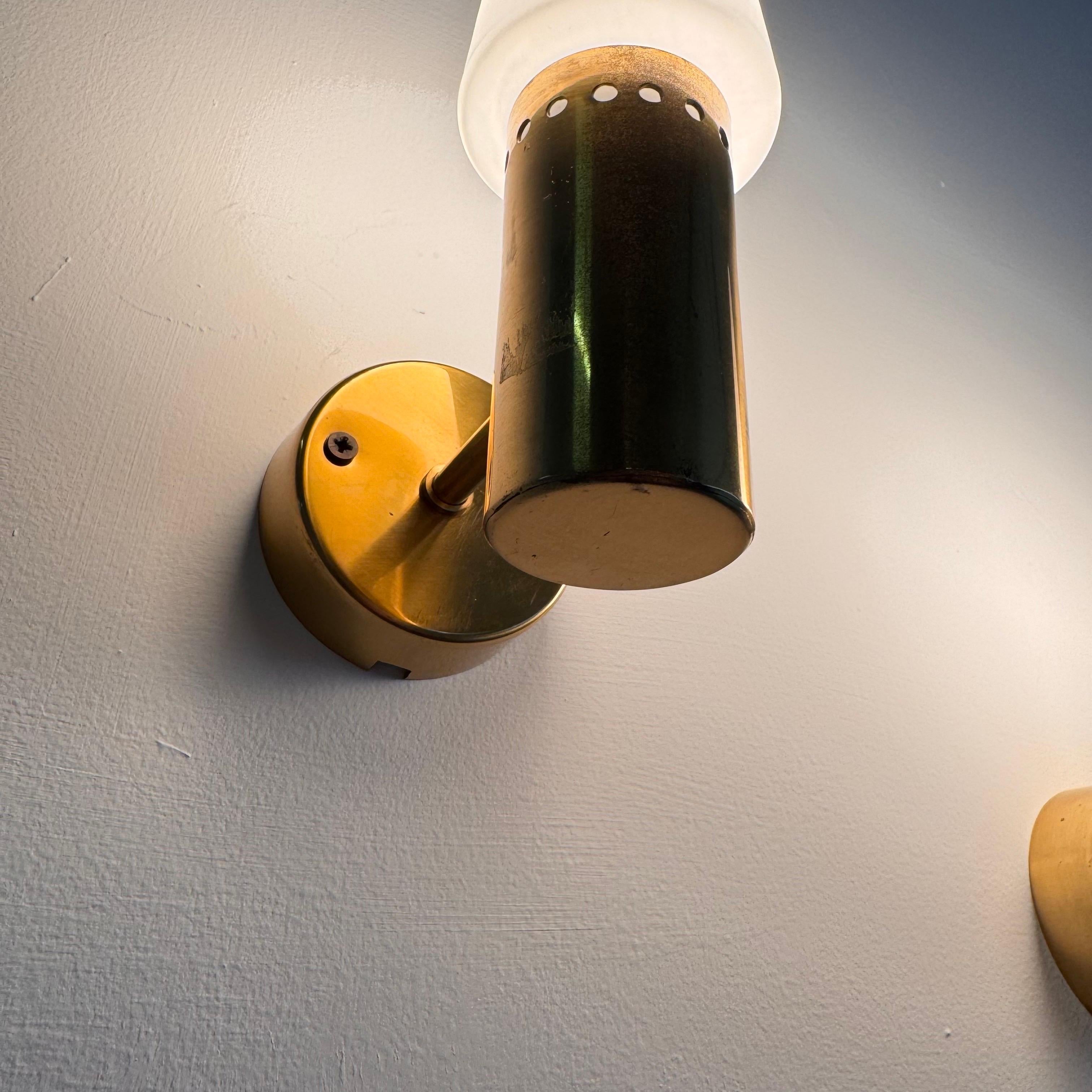 Set_of_2_Hans-Agne_Jakobsson_Brass_and_White_Opaline_Glass_Wall_Lights,_1960s