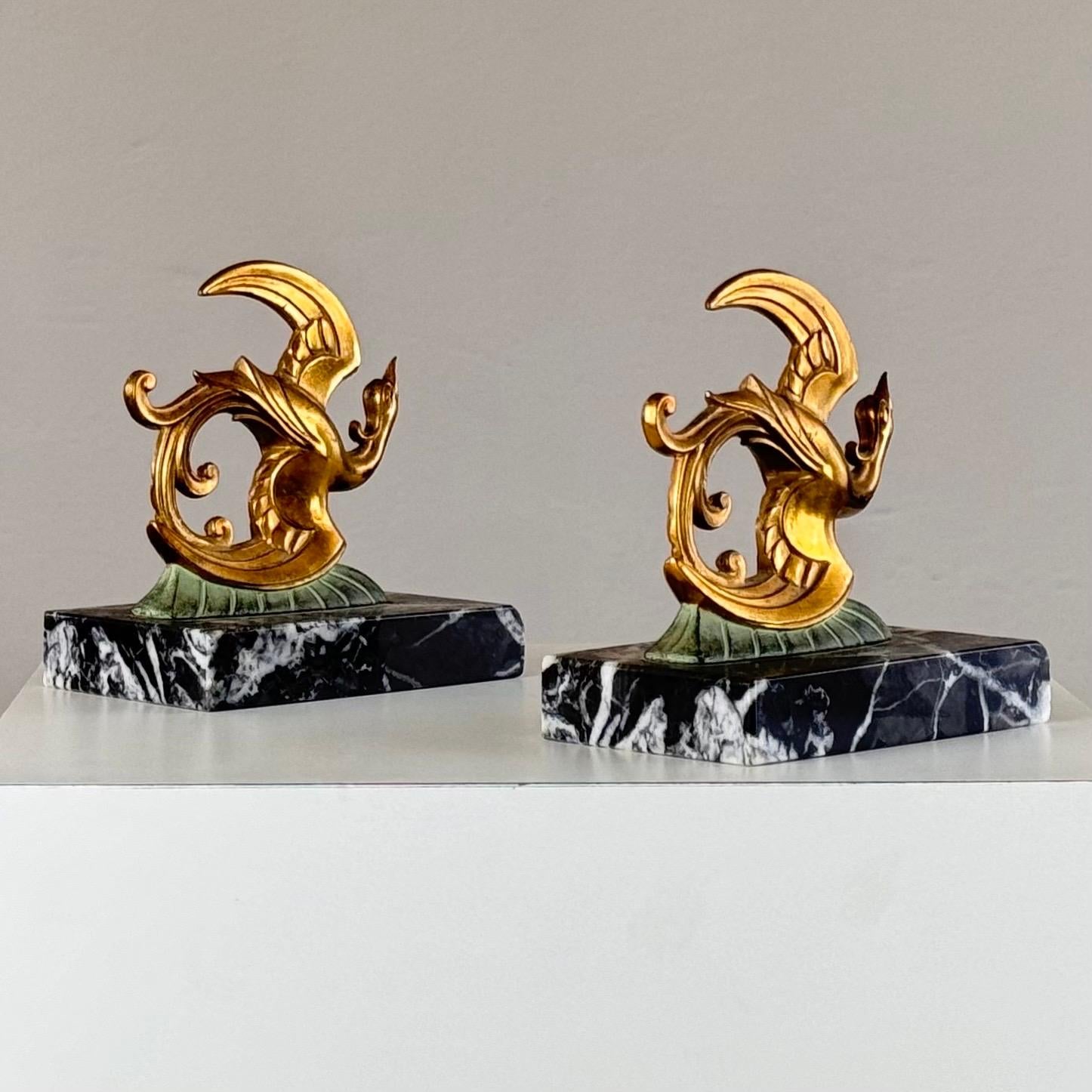 Set_of_2_Art_Deco_Birds_of_Paradise_Bookends_in_Bronze,_Brass_and_Black_Marble,_France,_1930s