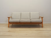 Oak_sofa,_Danish_design,_1960s,_designer:_Hans_J._Wegner,_manufacturer:_Getama