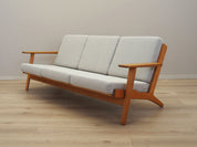 Oak_sofa,_Danish_design,_1960s,_designer:_Hans_J._Wegner,_manufacturer:_Getama