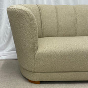 Mid-Century_Cabinetmaker_Curved_Sofa_Bouclé_1940s_Denmark