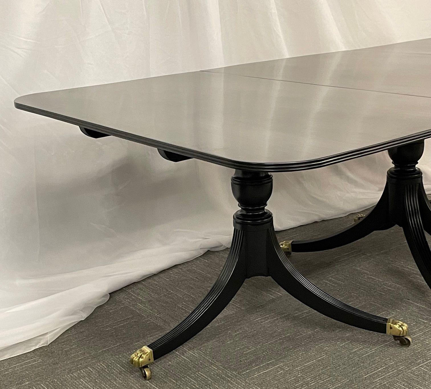Hollywood_Regency_Triple_Pedestal_Ebony_Dining_Table,_Maison_Jansen_1920s
