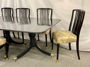 Hollywood_Regency_Triple_Pedestal_Ebony_Dining_Table,_Maison_Jansen_1920s
