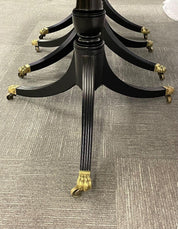 Hollywood_Regency_Triple_Pedestal_Ebony_Dining_Table,_Maison_Jansen_1920s