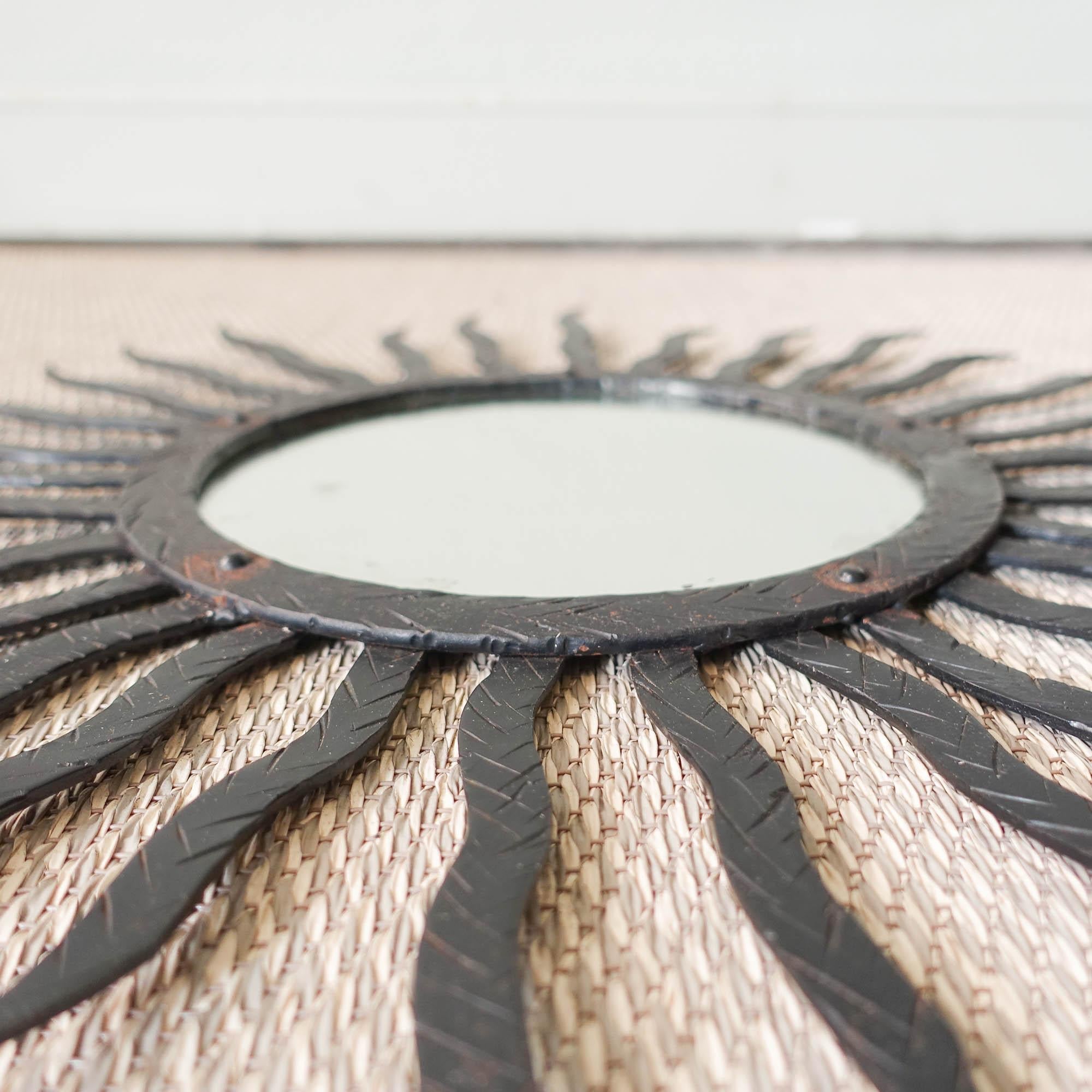 Black_Sunburst_Mirror,_Mid_Century_Modern_Wall_Mirror,_1950s,_Europe