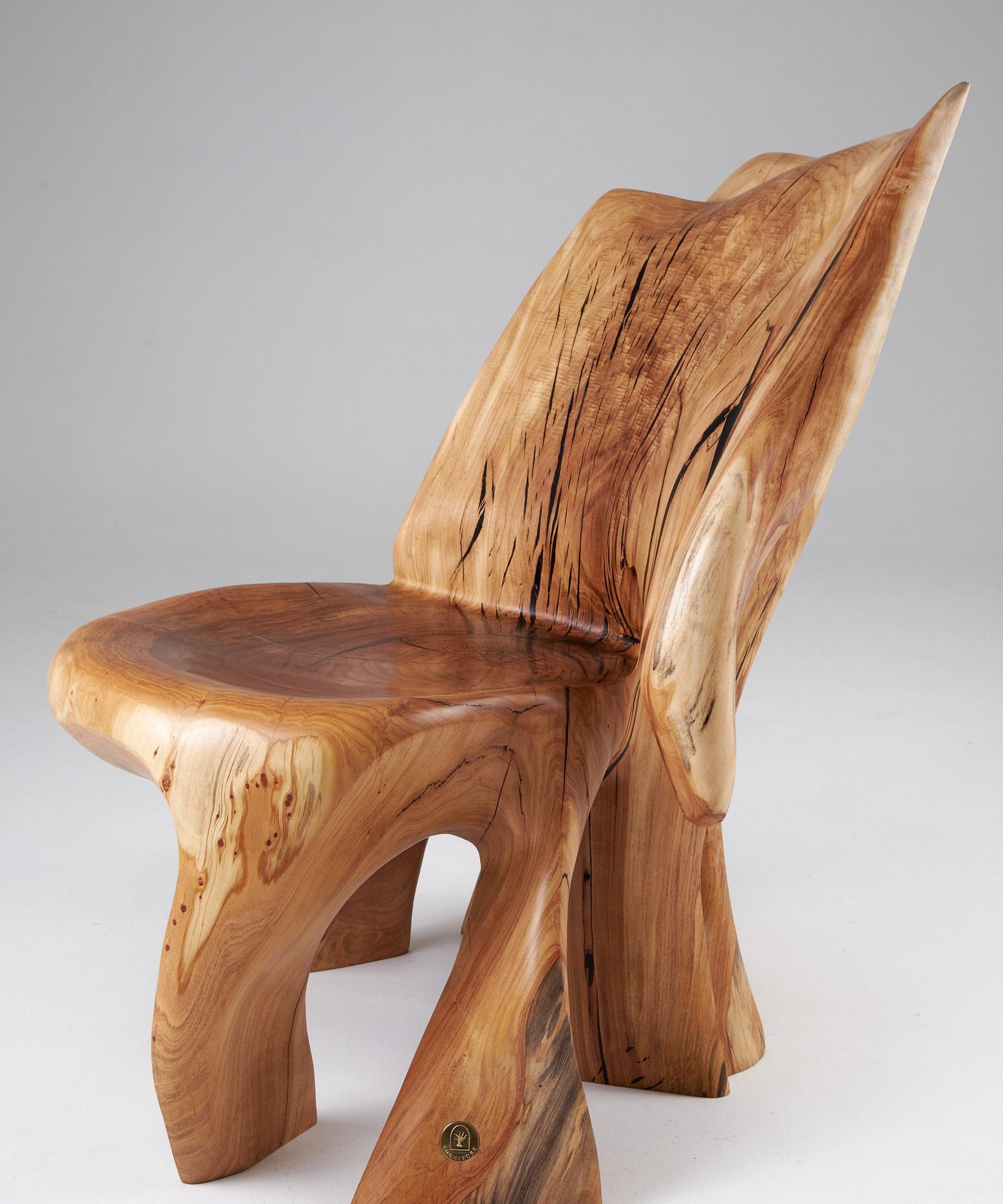 Veles_Wooden_Lounge_Chair_Carved_From_Single_Piece_of_Wood,_Logniture