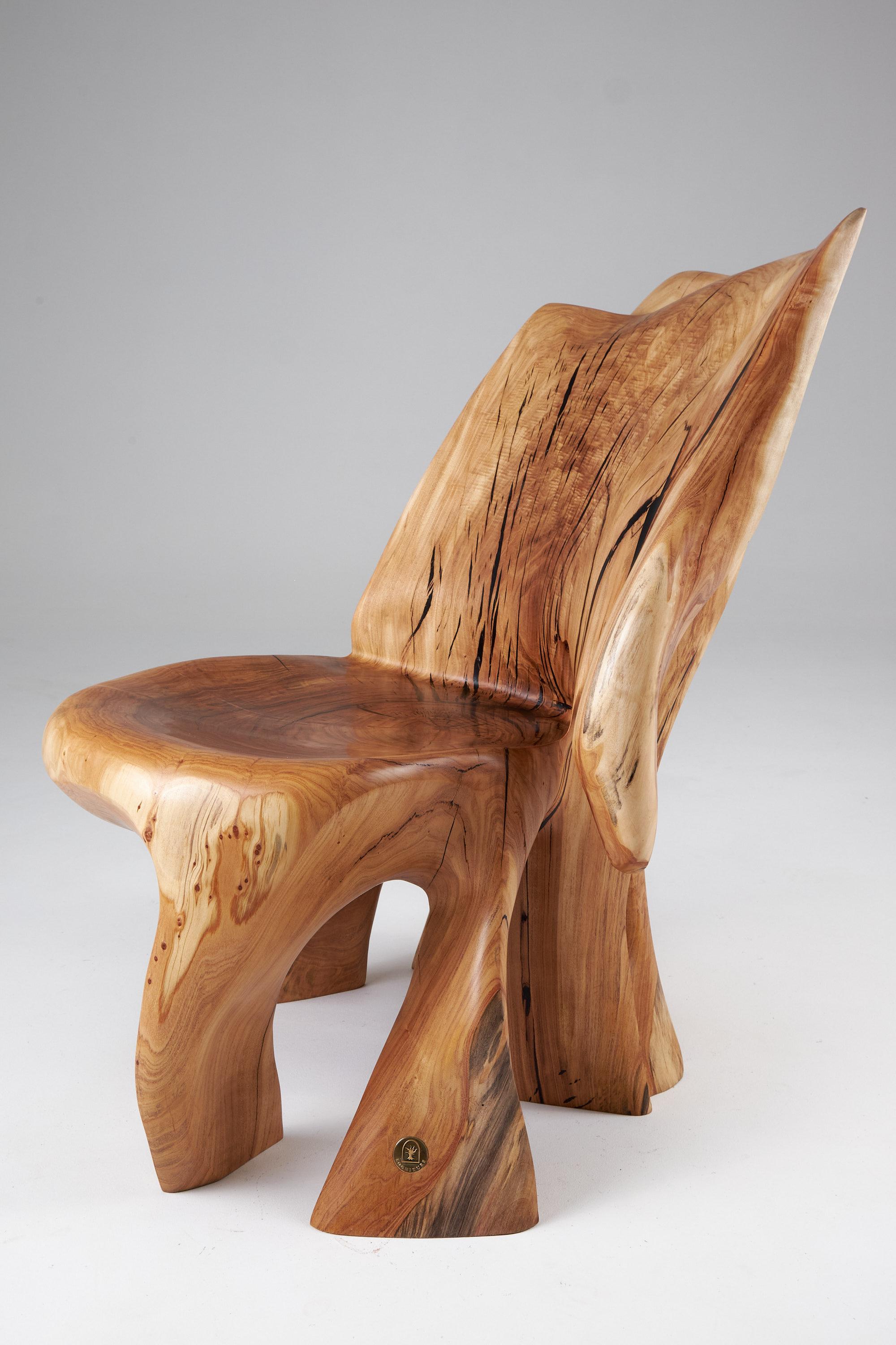 Veles_Wooden_Lounge_Chair_Carved_From_Single_Piece_of_Wood,_Logniture