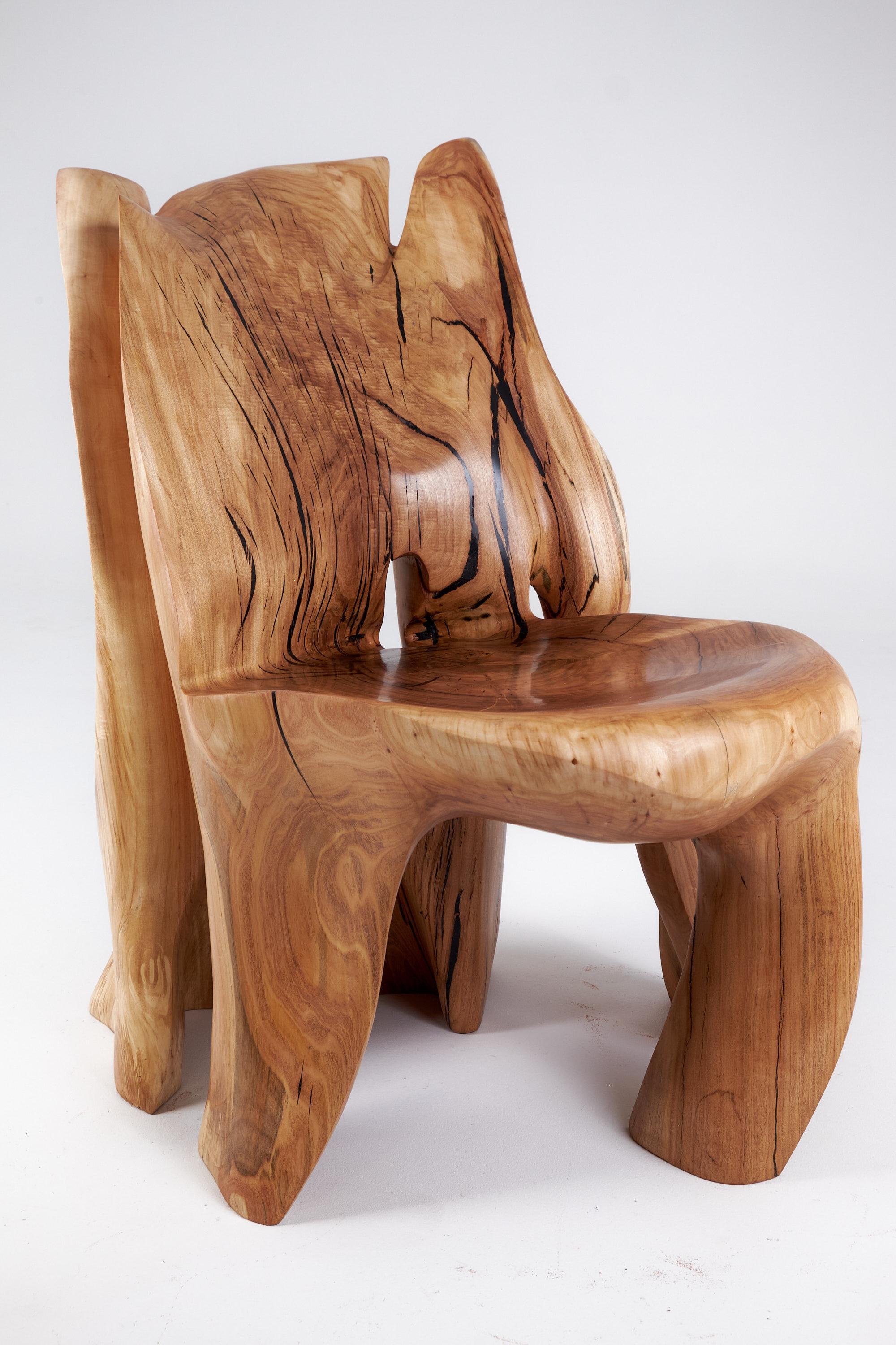 Veles_Wooden_Lounge_Chair_Carved_From_Single_Piece_of_Wood,_Logniture