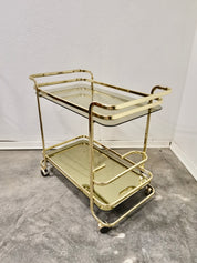 1980s_Italian_Brass_Bar_Cart_with_Smoked_Glass_&_Gold-Mirror_Shelf_(Hollywood_Regency)