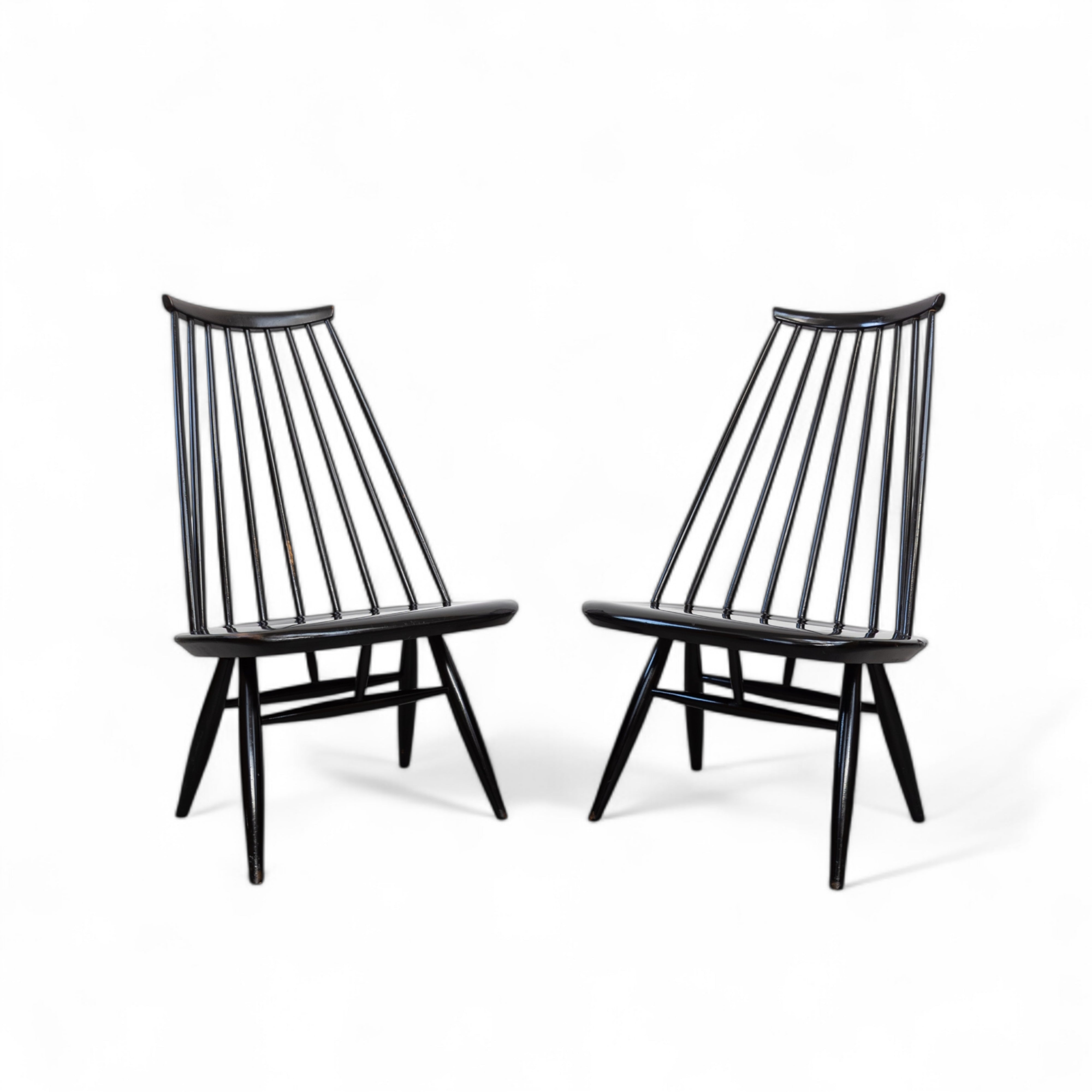 Early_Mademoiselle_lounge_chairs_by_Ilmari_Tapiovaara_for_Asko,_1950s