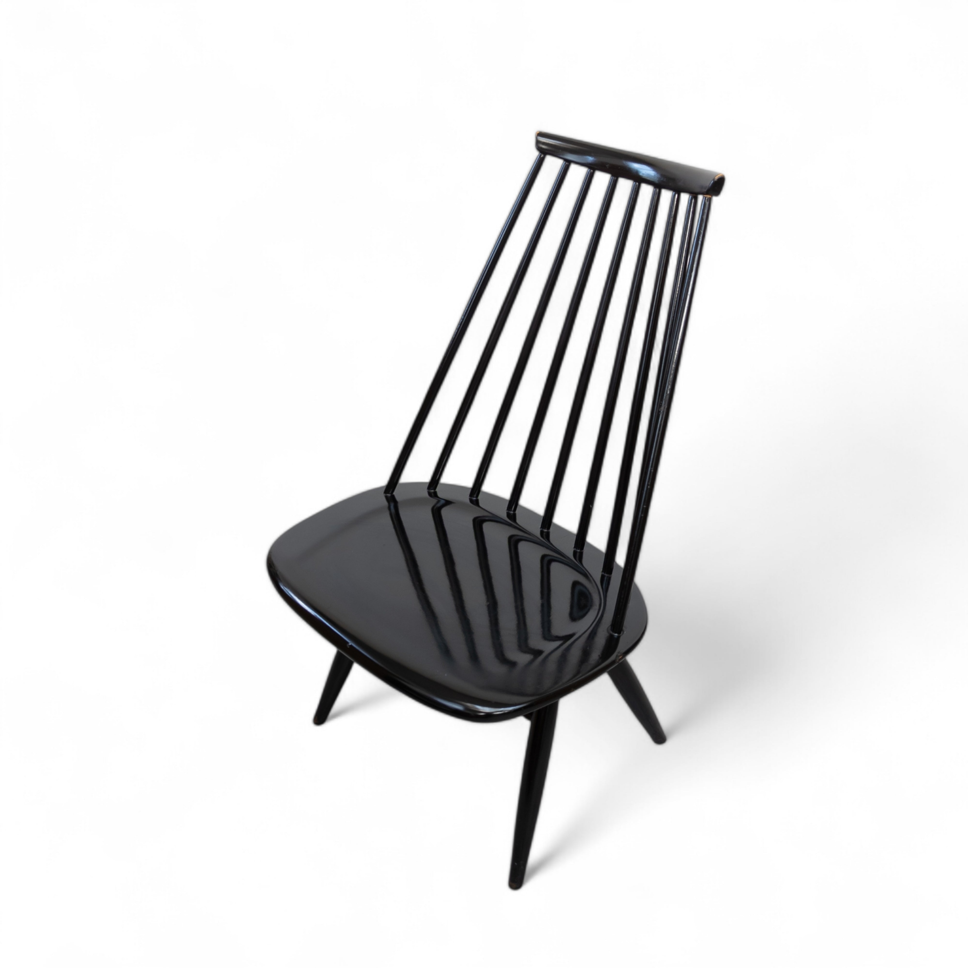 Early_Mademoiselle_lounge_chairs_by_Ilmari_Tapiovaara_for_Asko,_1950s