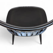 Early_Mademoiselle_lounge_chairs_by_Ilmari_Tapiovaara_for_Asko,_1950s