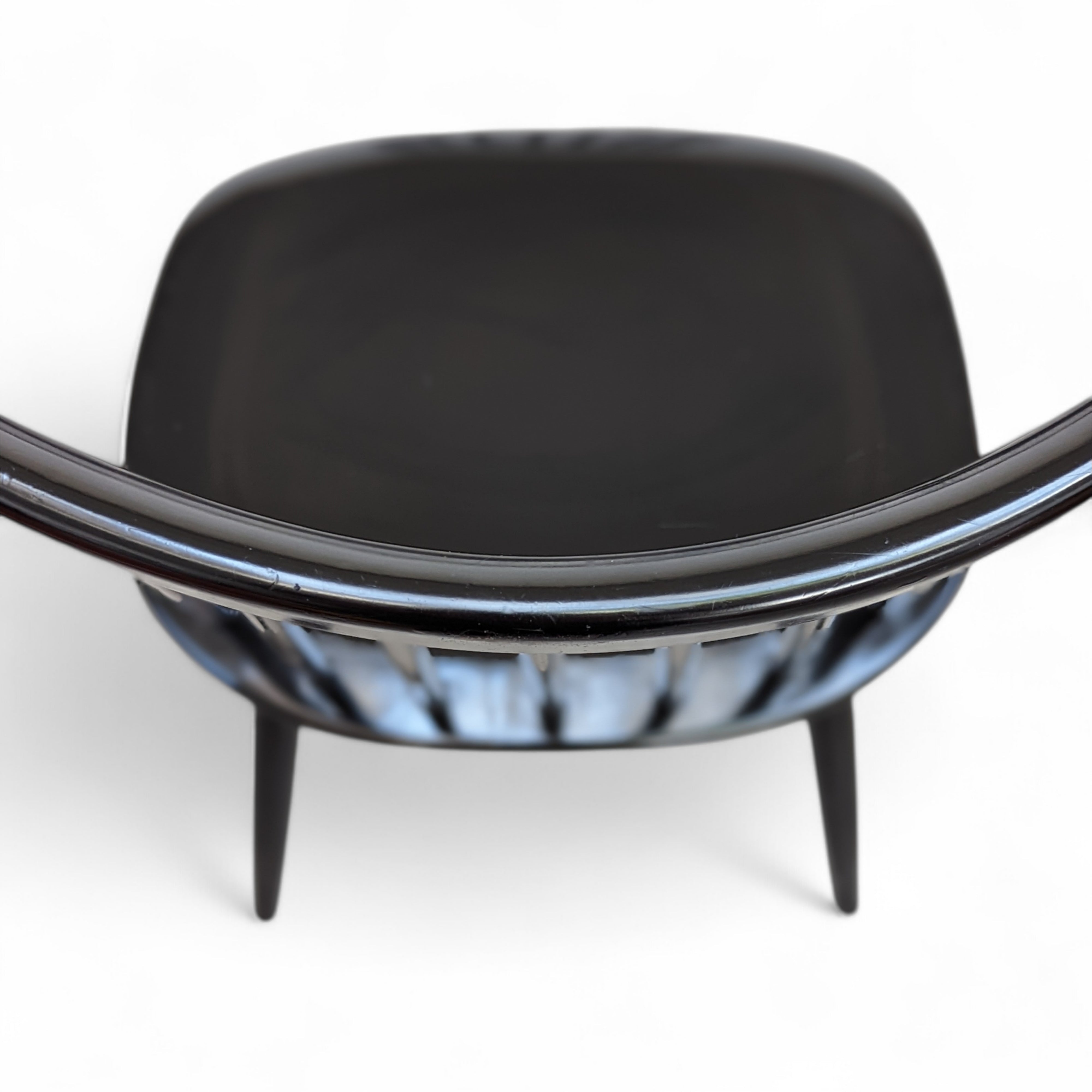 Early_Mademoiselle_lounge_chairs_by_Ilmari_Tapiovaara_for_Asko,_1950s