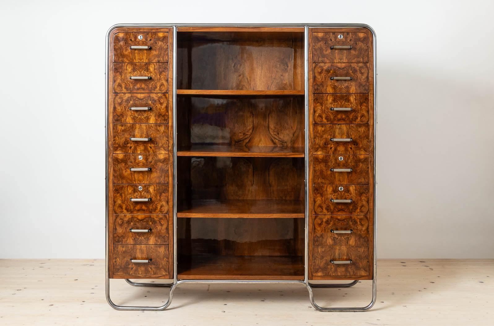 Bauhaus_Era_Bookcase,_Tubular_Steel_Base,_Walnut_Veneer,_1930s