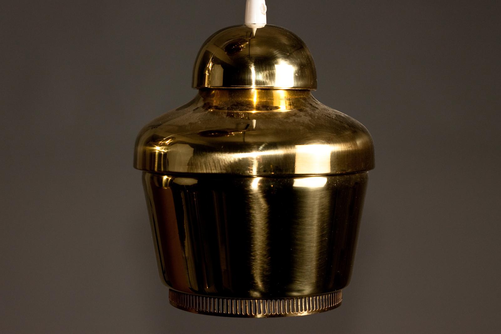 Set_of_4_Alvar_Aalto_circa_1950's_Golden_bell_A330_pendants,_Valaistustyö_Ky