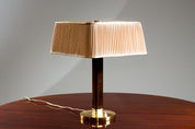 Paavo_Tynell,_1940's_brass_desk_lamp,_model_5066_for_TAITO_Oy,_Finland