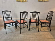 Set_of_6_Scandinavian_Modern_Chairs_model_Charlotte,_black_lacqured_wood