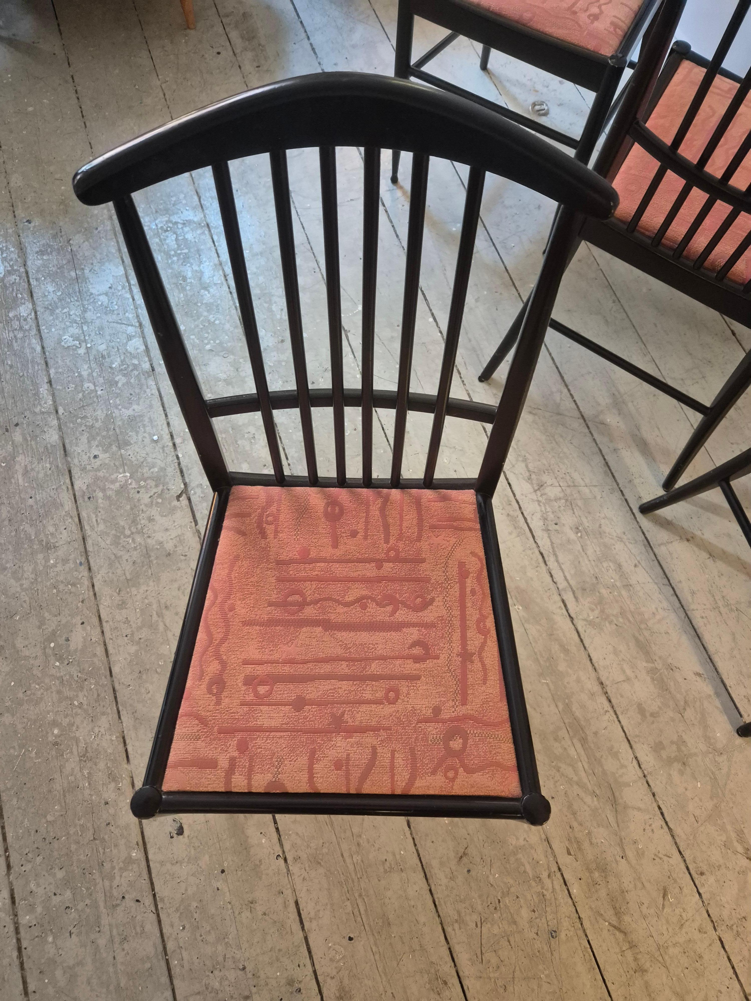 Set_of_6_Scandinavian_Modern_Chairs_model_Charlotte,_black_lacqured_wood