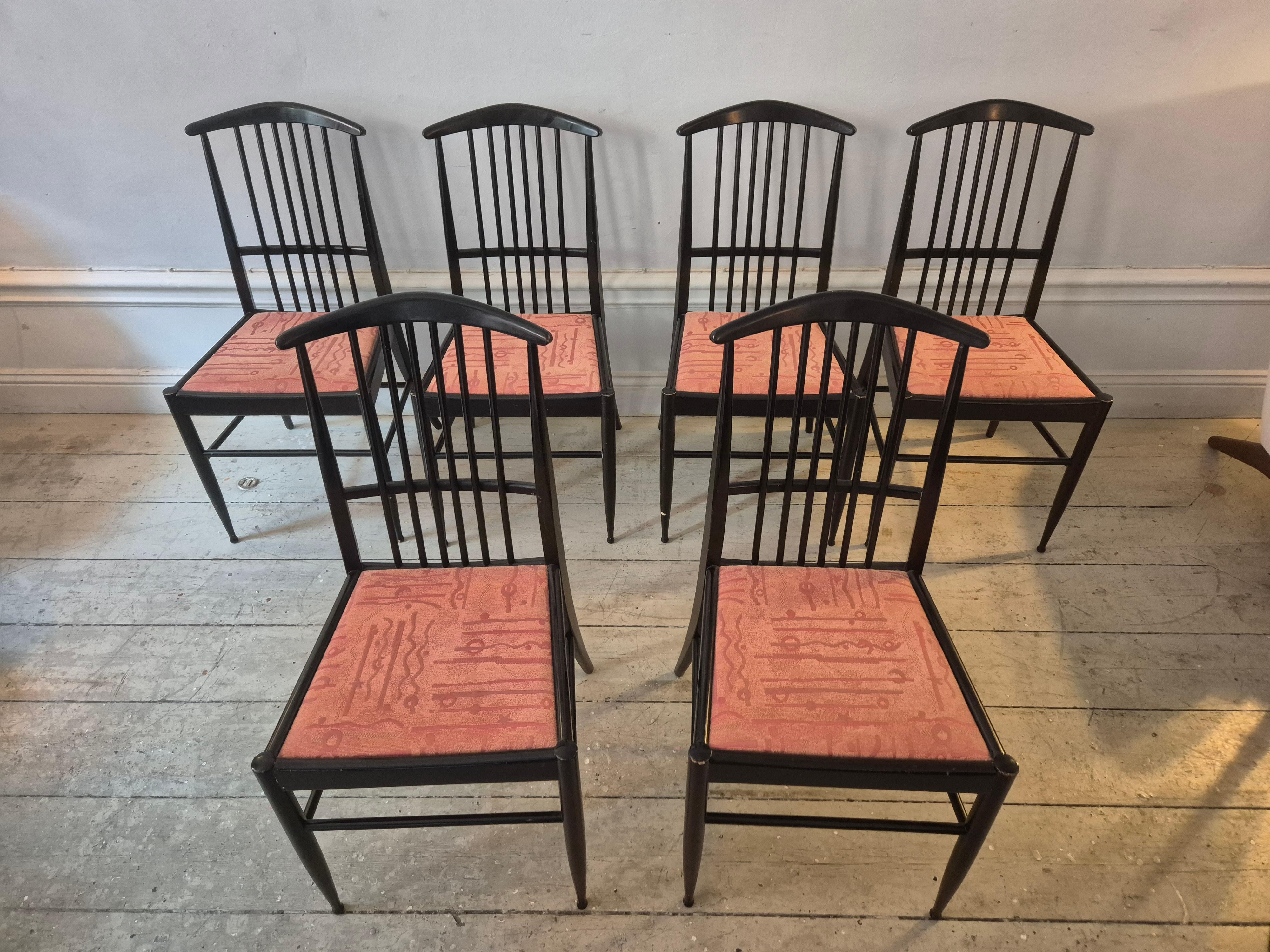 Set_of_6_Scandinavian_Modern_Chairs_model_Charlotte,_black_lacqured_wood