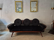 A_rare_stylish_sofa_by,_Midcentury_Modern._Re-upholstered_in_black_velvet