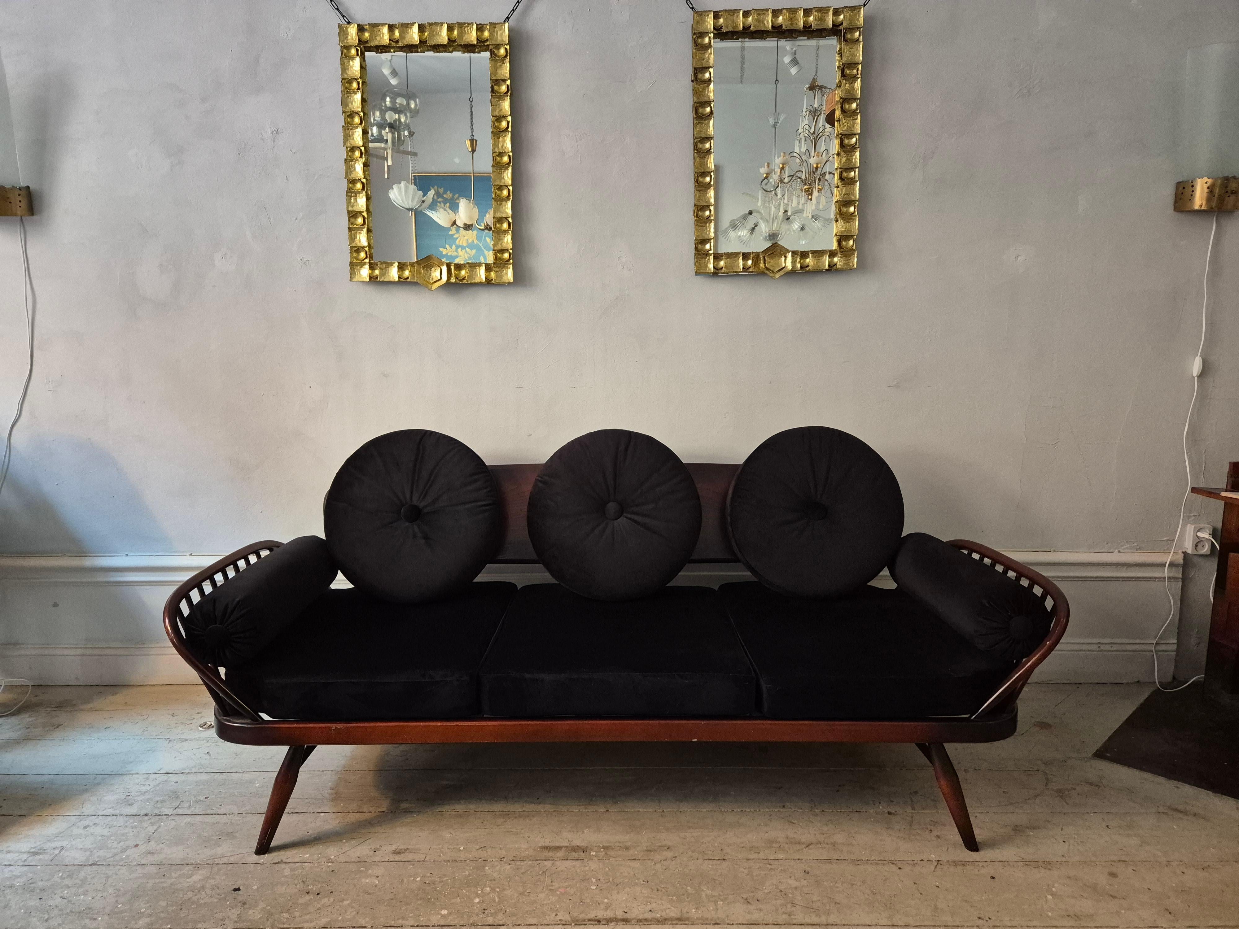 A_rare_stylish_sofa_by,_Midcentury_Modern._Re-upholstered_in_black_velvet