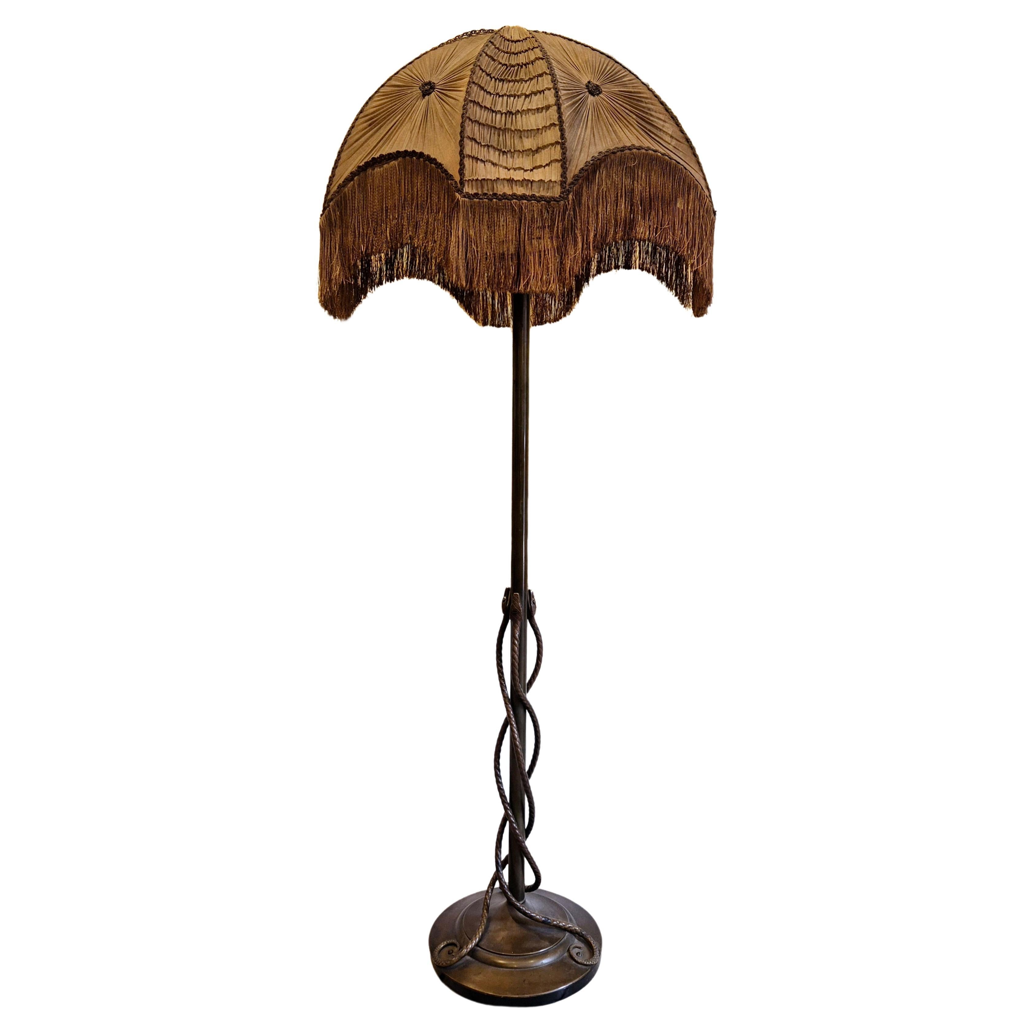 Rare_exquisite_bronze_floor_lamp_with_entwined_snakes,_early_1900s.