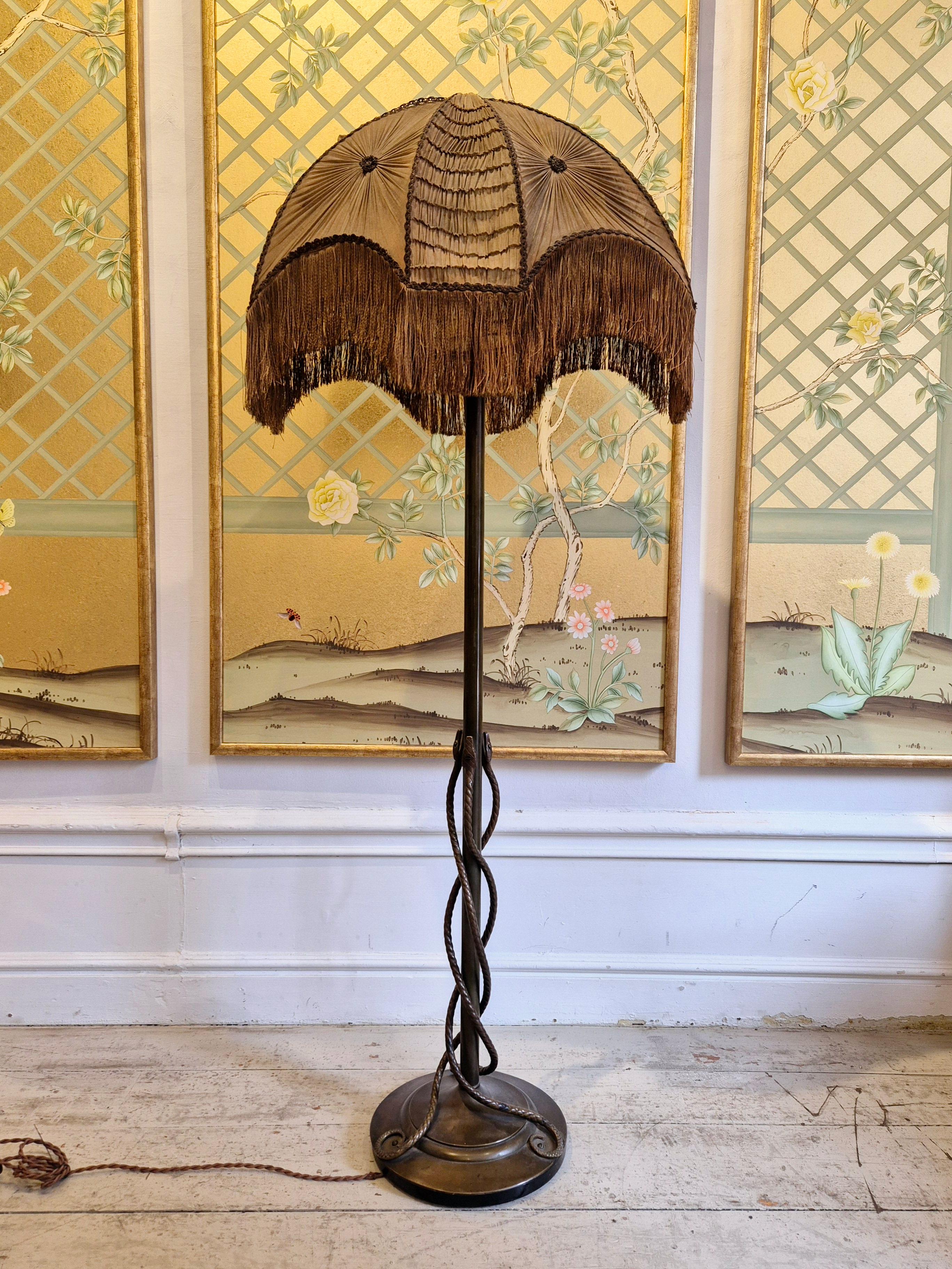 Rare_exquisite_bronze_floor_lamp_with_entwined_snakes,_early_1900s.
