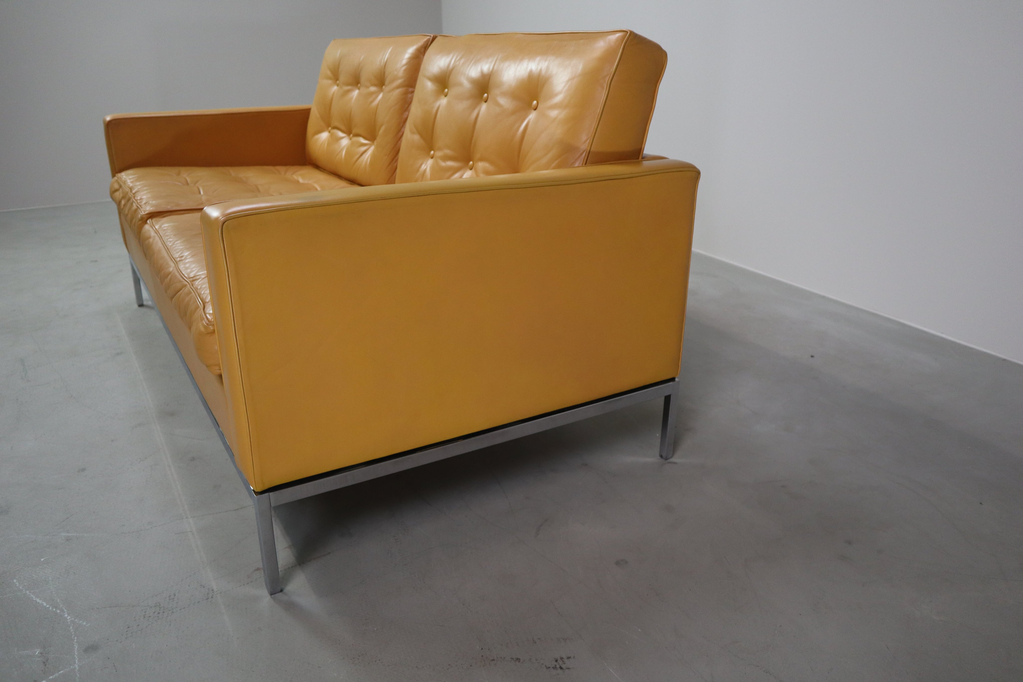 Florence_Knoll_two-seater_sofa_in_mustard_yellow_leather,_1970