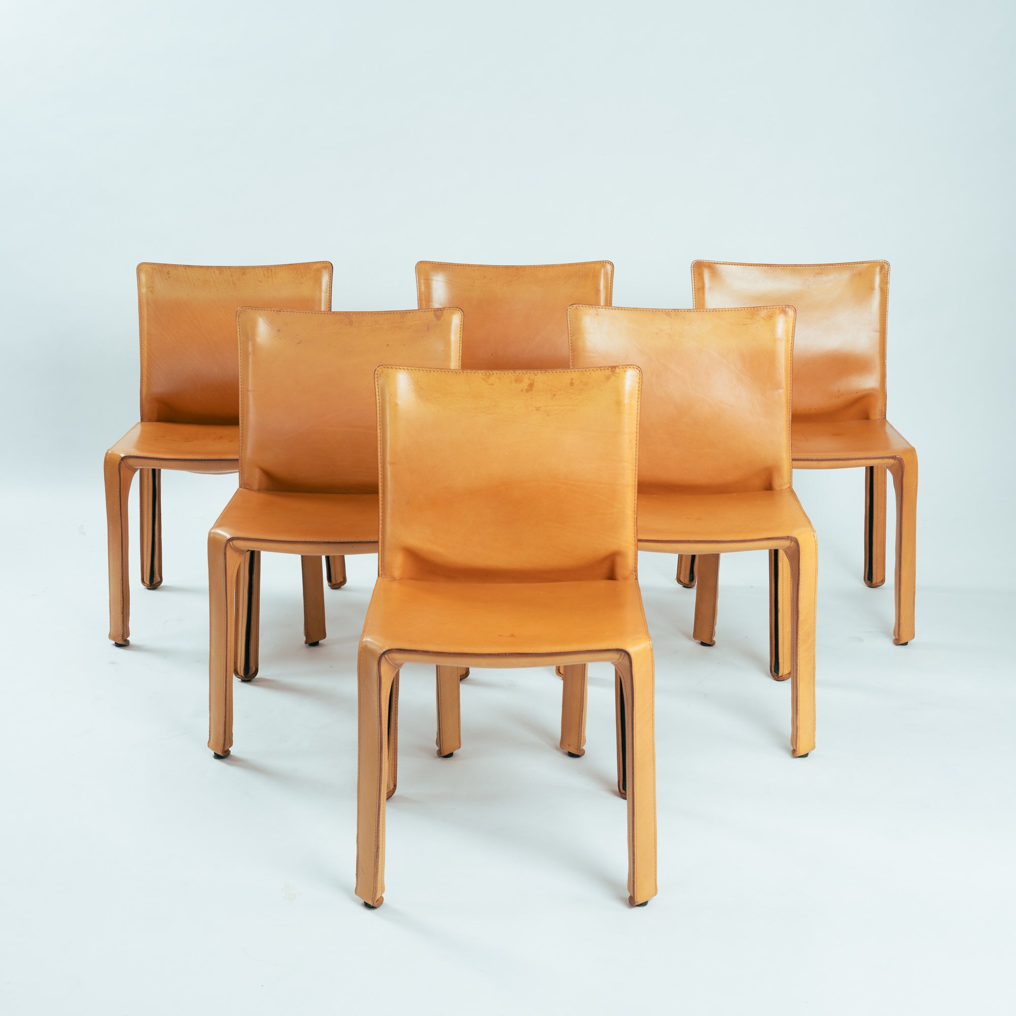 Set_of_6_Mario_Bellini_Model_412_Cab_Dining_Chairs_in_Cognac_Leather_for_Cassina,_Italy