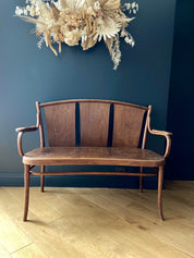 Bistro_style_bench_in_embossed_wood_stamped_Thonet_-_early_20th_century.