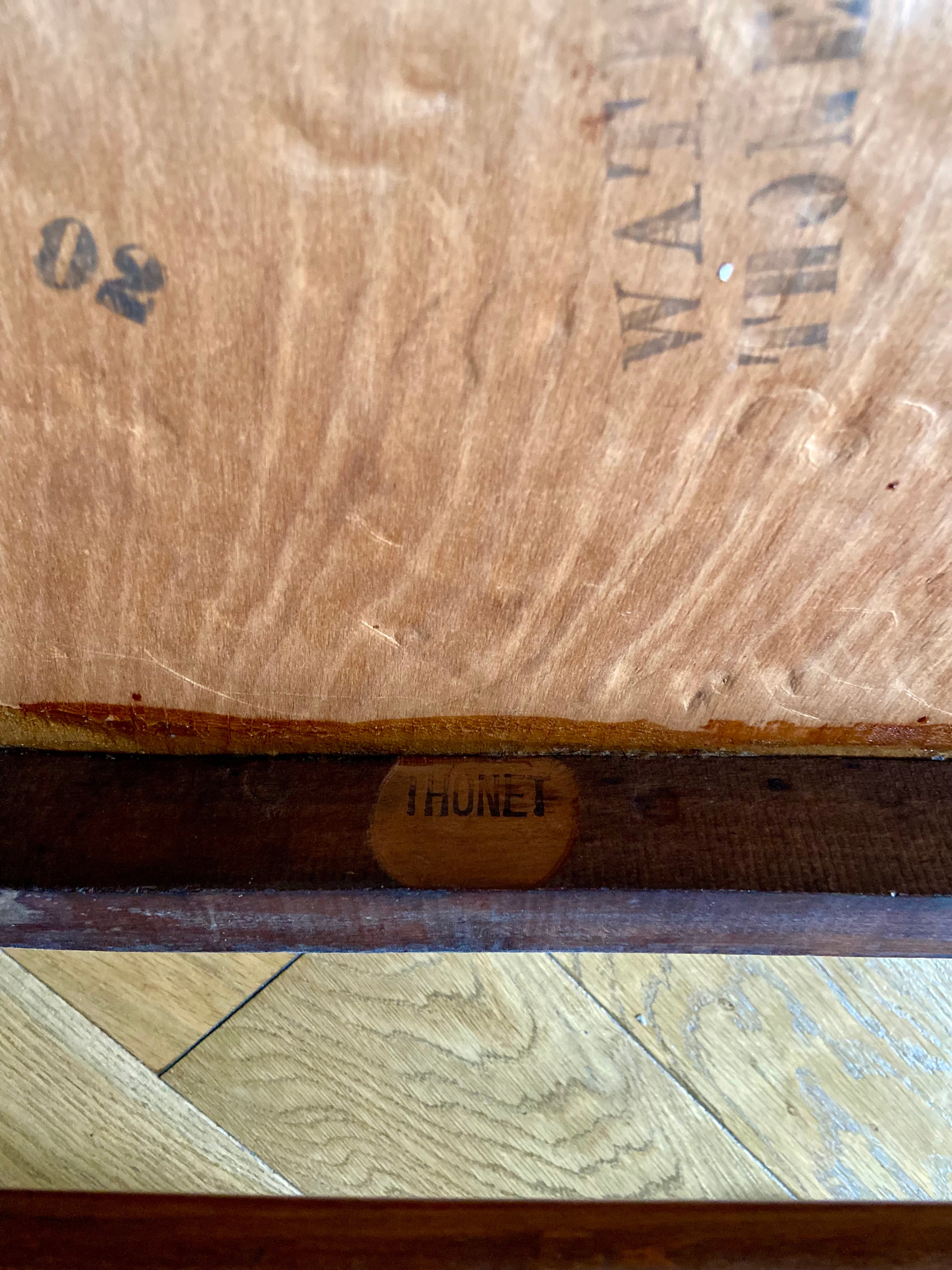 Bistro_style_bench_in_embossed_wood_stamped_Thonet_-_early_20th_century.