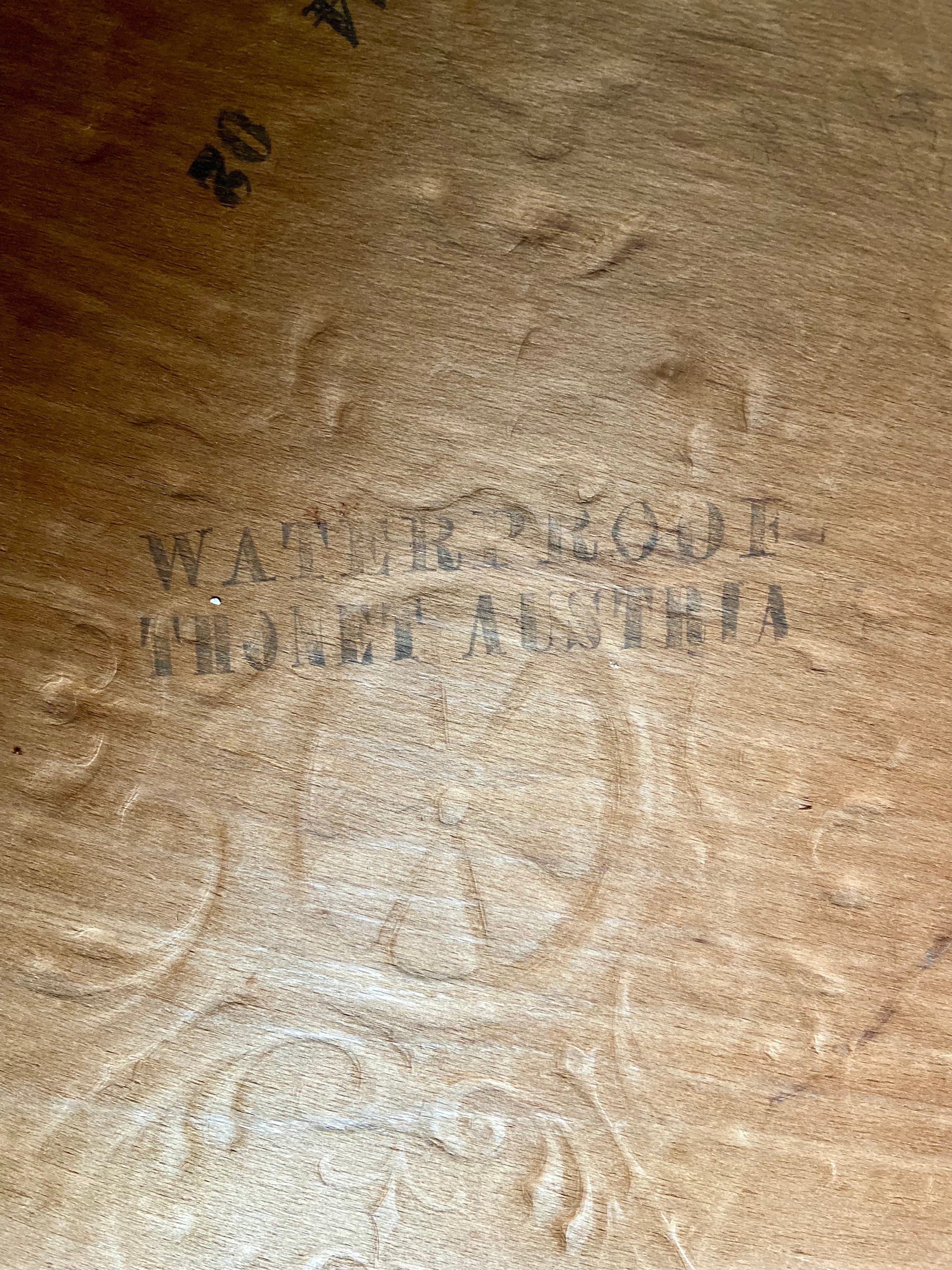 Bistro_style_bench_in_embossed_wood_stamped_Thonet_-_early_20th_century.