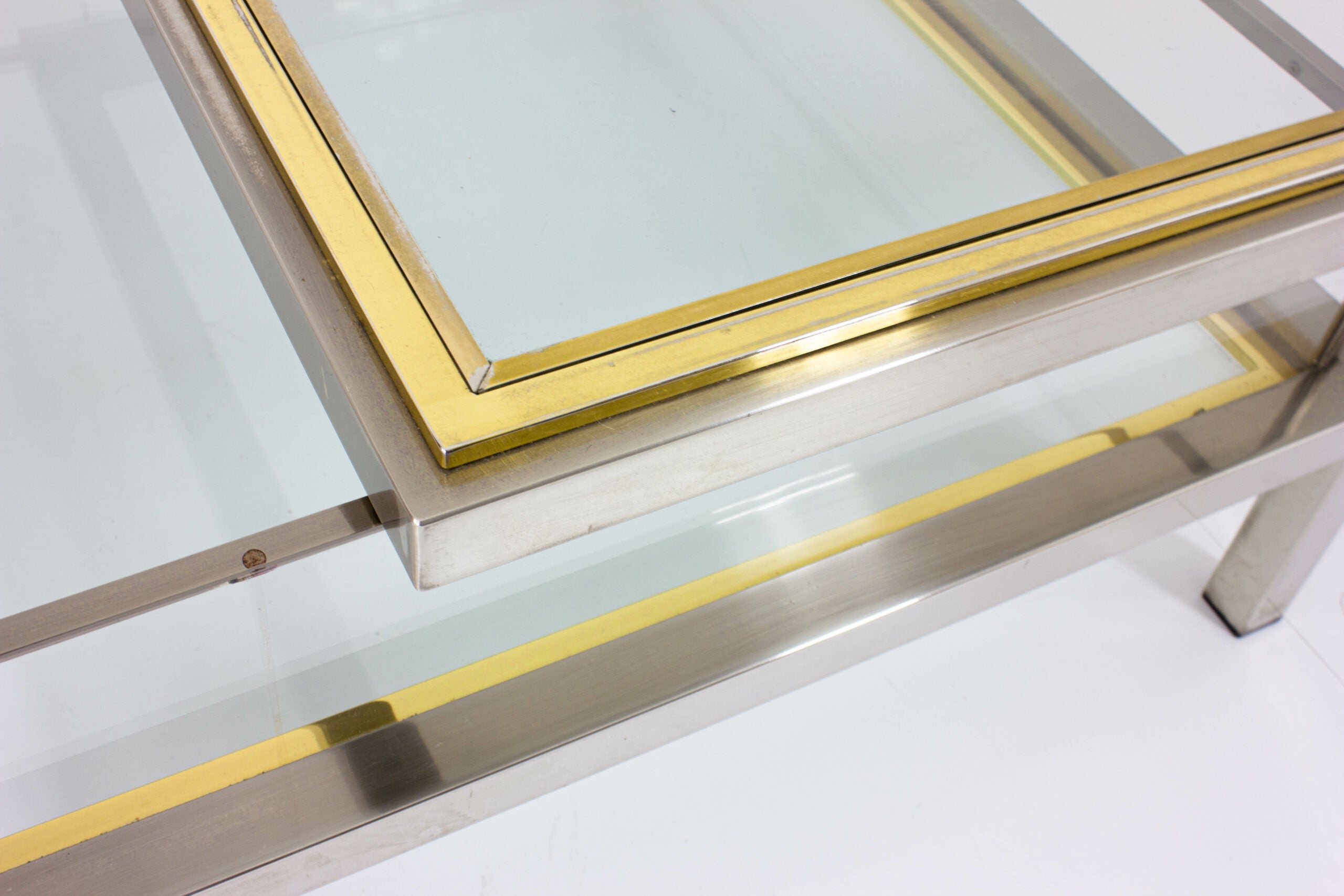 Brass_and_Chrome_regency_sliding_top_table