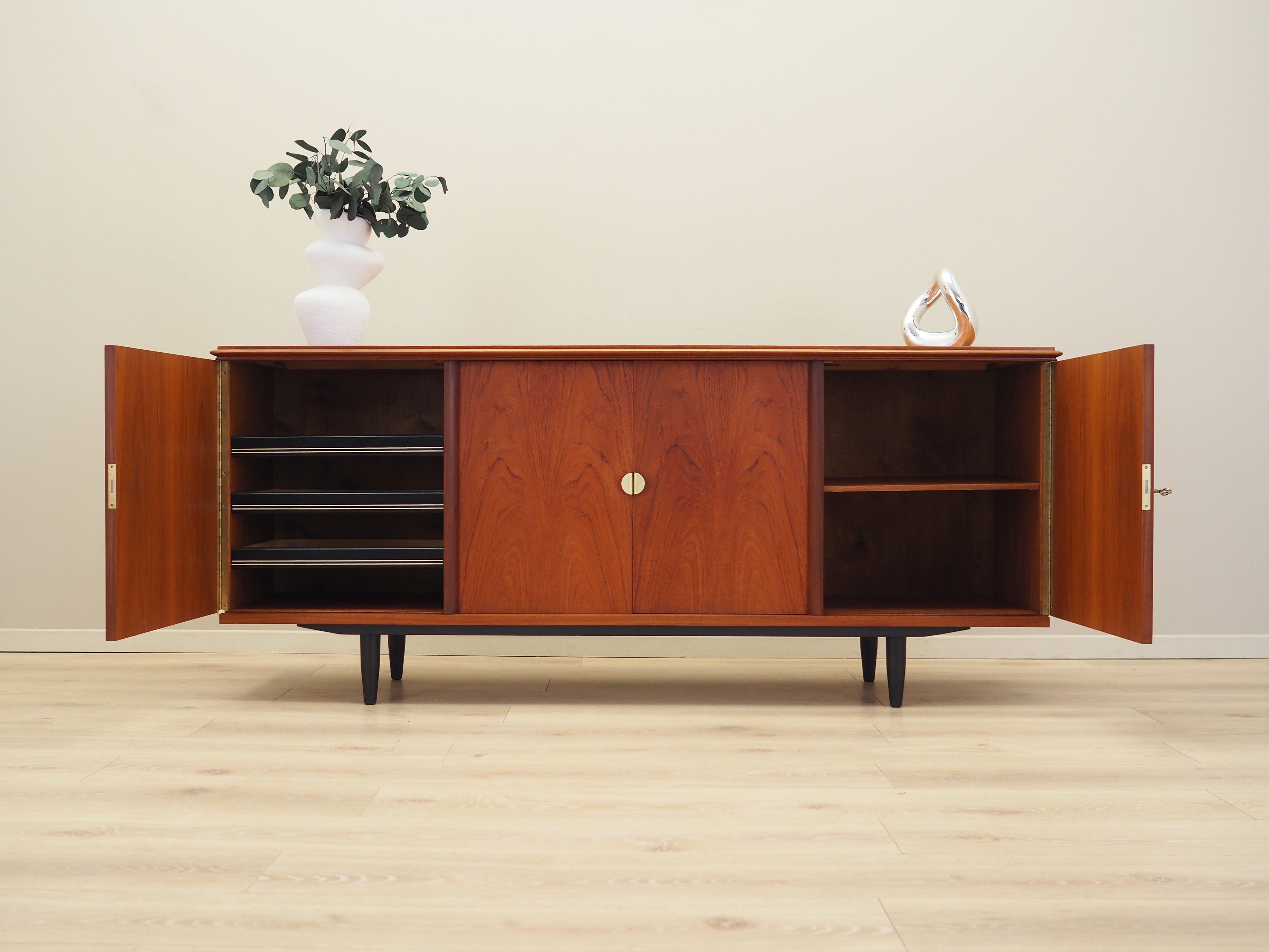 Brown_Teak_sideboard_in_Danish_design_from_1970s