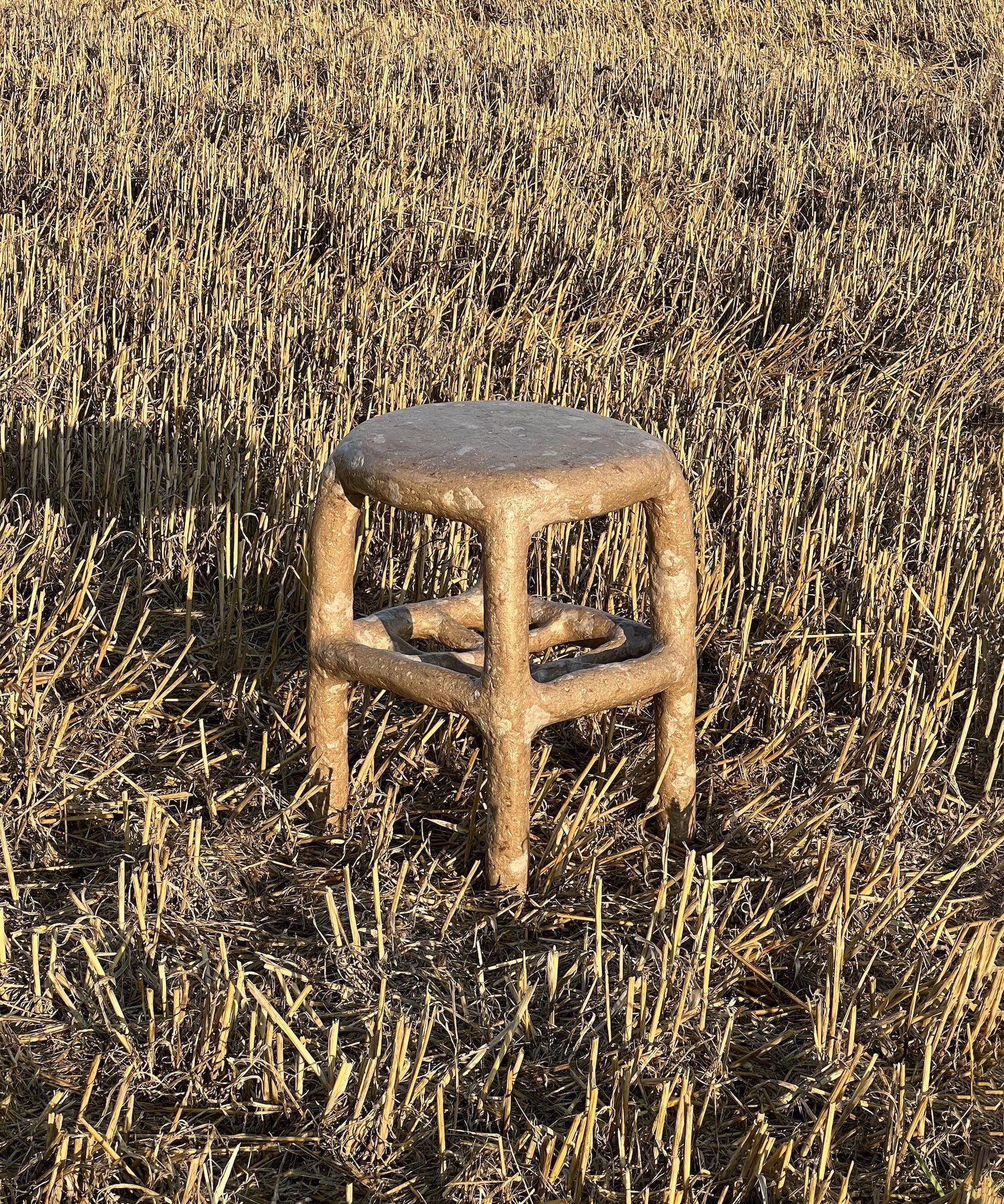 Brown_terazzo_papier-mache_stool_or_table