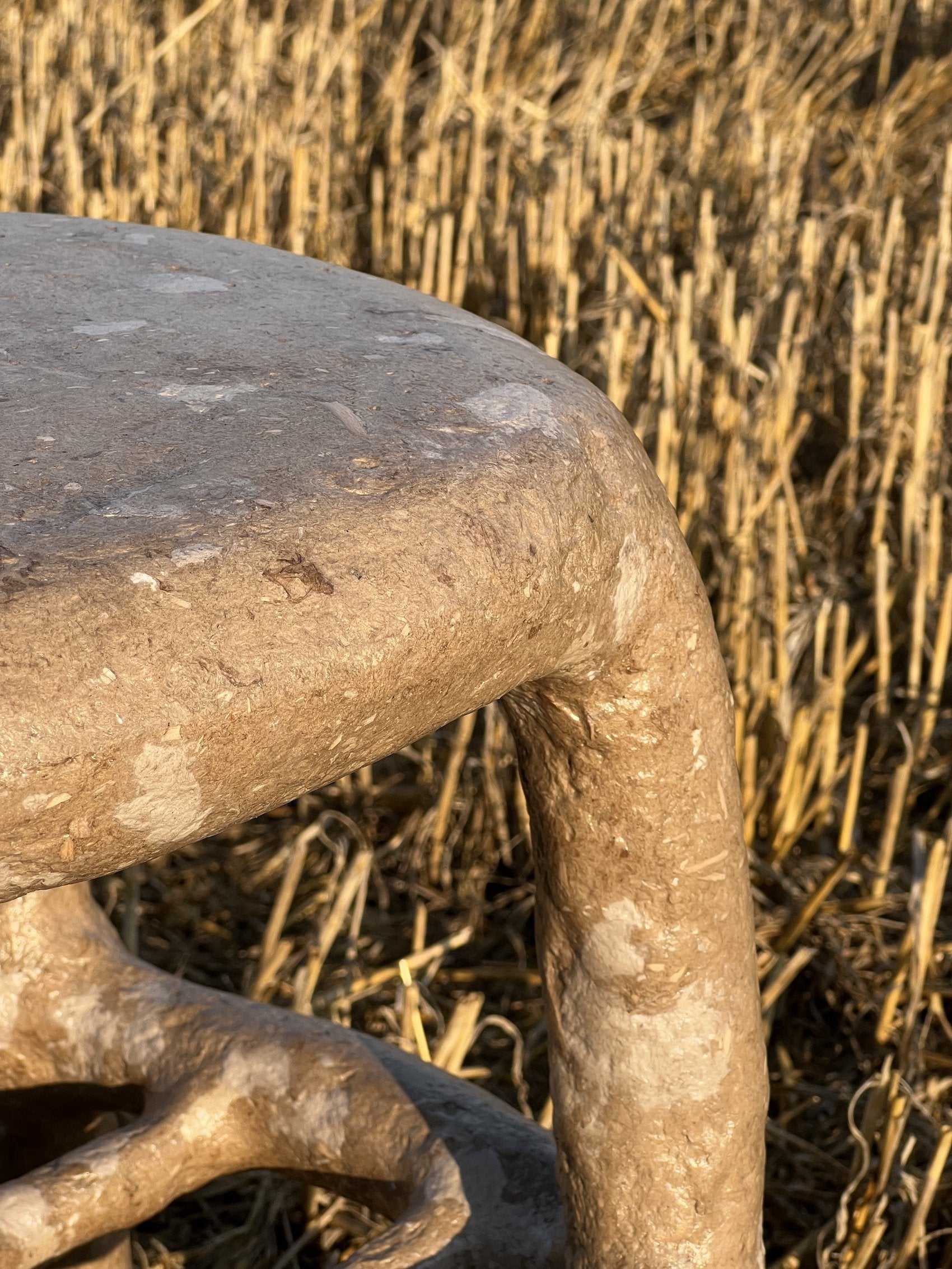 Brown_terazzo_papier-mache_stool_or_table