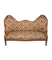 Carved_walnut_loveseat_from_1930