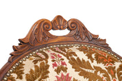 Carved_walnut_loveseat_from_1930