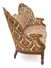 Carved_walnut_loveseat,_1930
